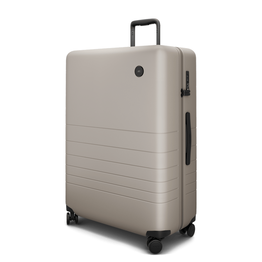 Desert Taupe Hover | Angle view of Check-In Large in Desert Taupe