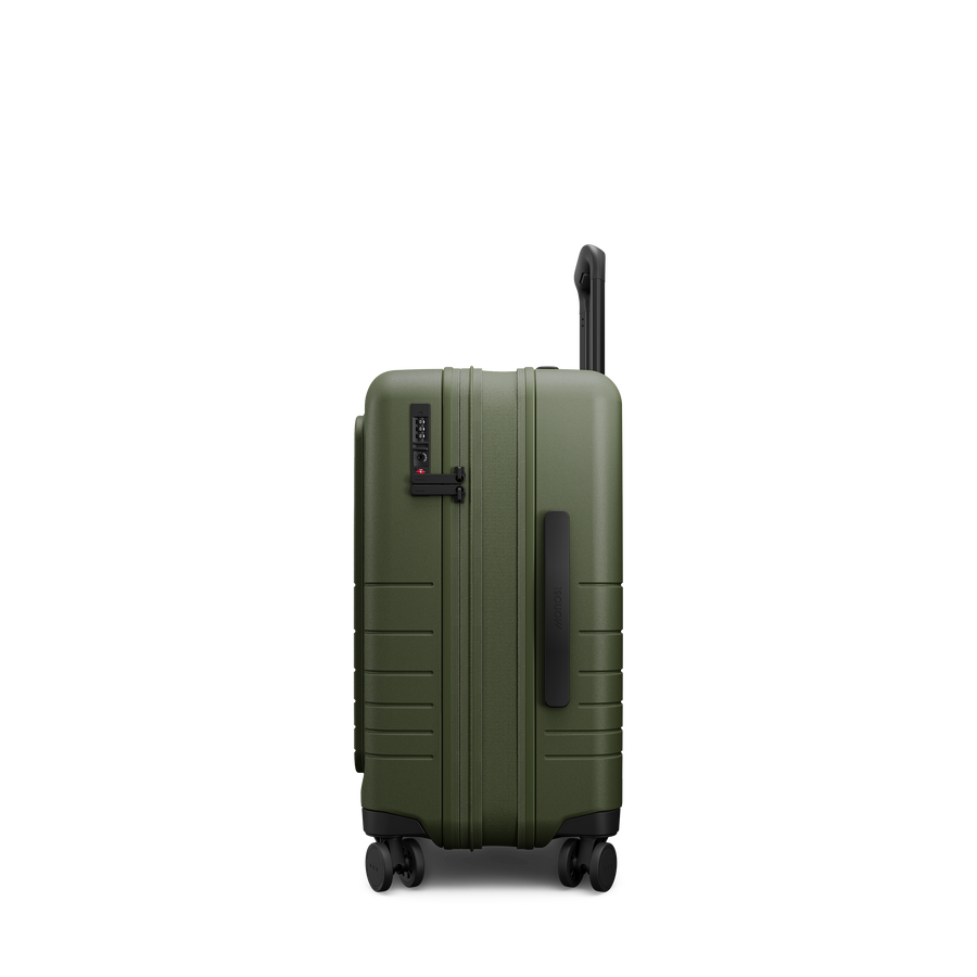 Olive Green Hover | Side view of Expandable Carry-On Pro in Olive Green