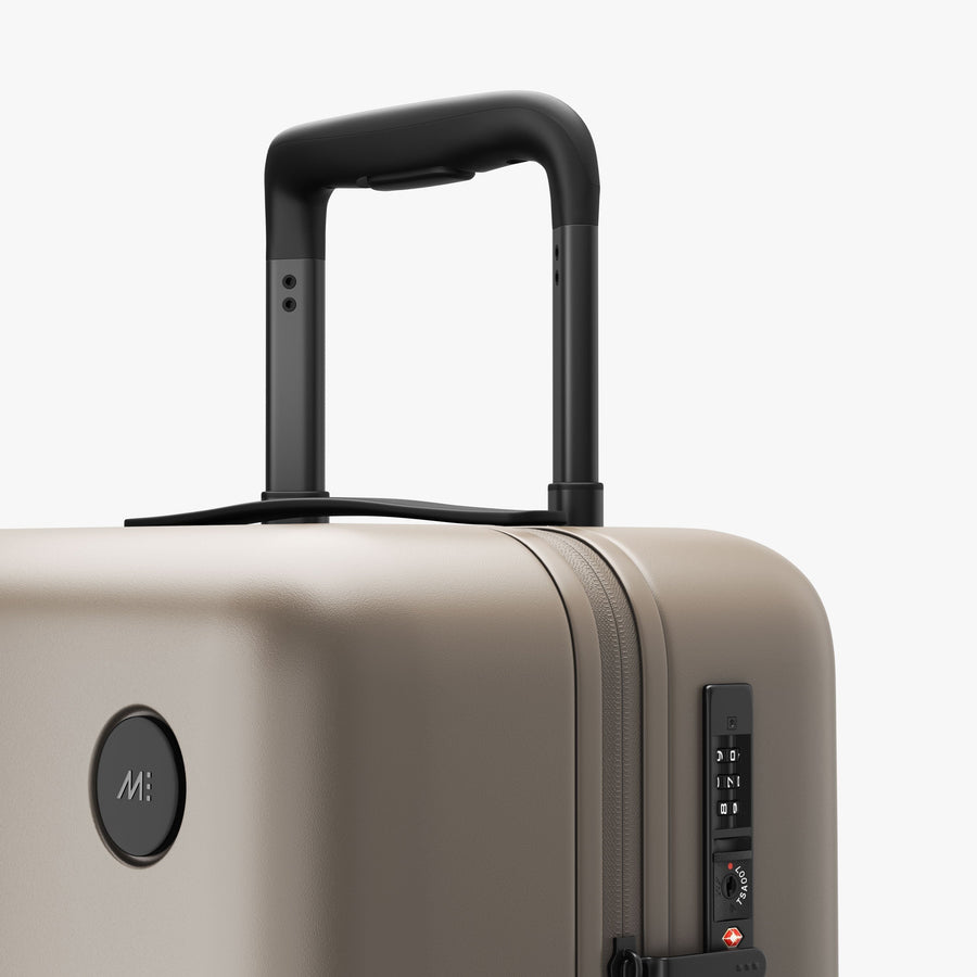 Desert Taupe | Luggage handle view of Carry-On in Desert Taupe