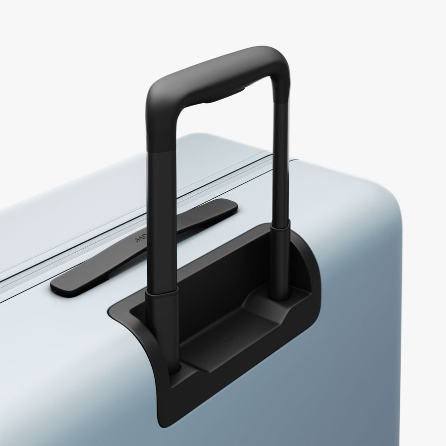 Blue Haze | Extended luggage handle view of Check-In Large in Blue Haze