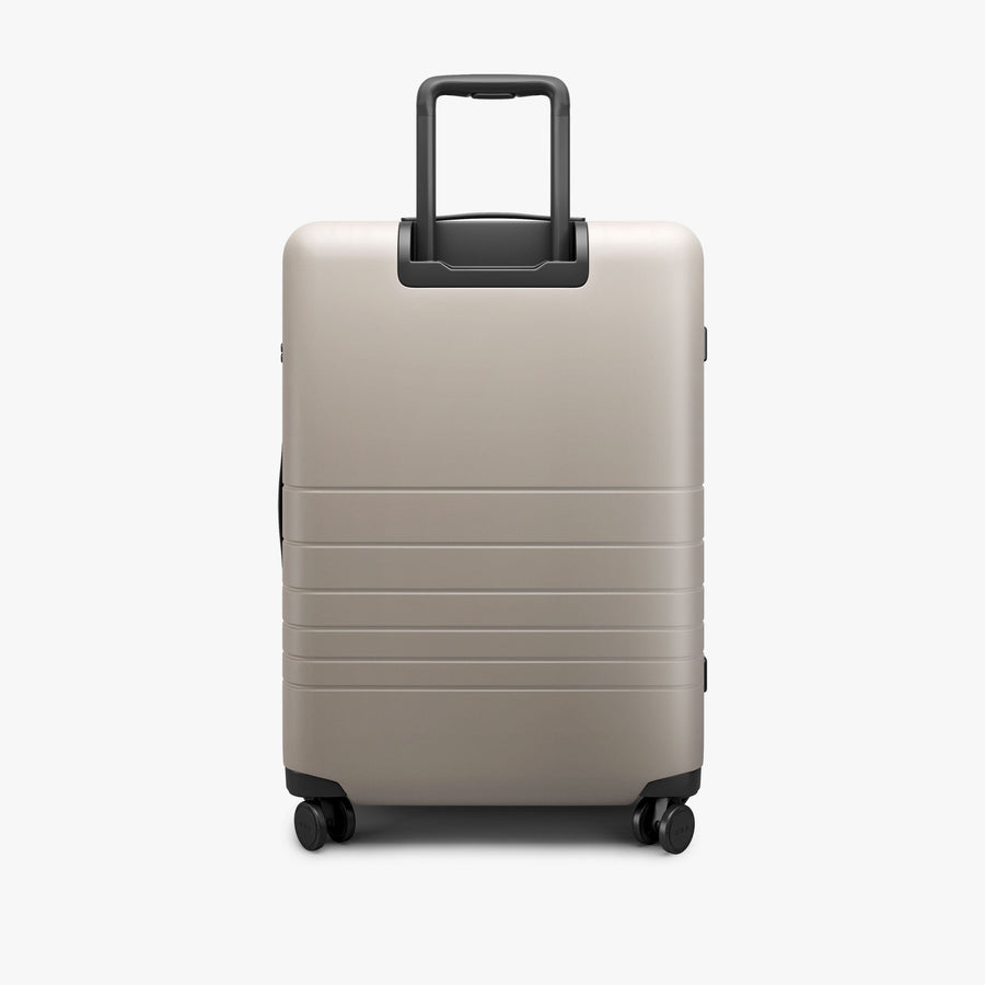 Desert Taupe | Back view of Check-In Medium in Desert Taupe