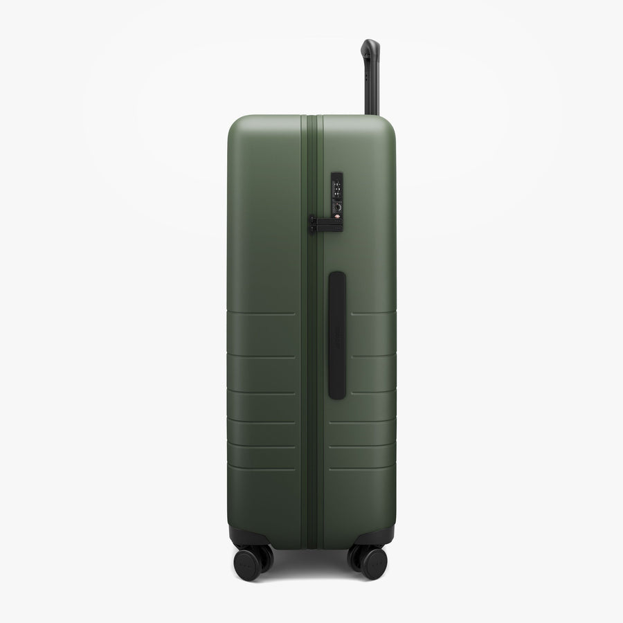 Olive Green | Side view of Check-In Large in Olive Green