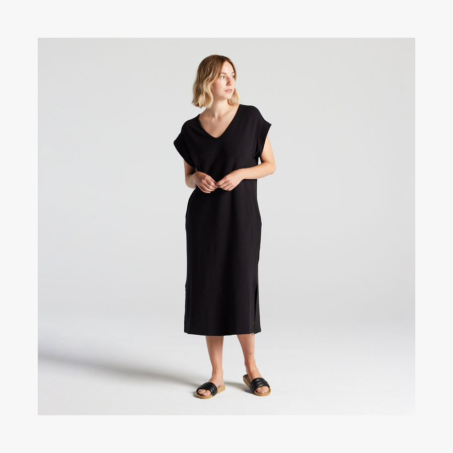 Black | Full body front view of woman in Sevilla Dress Black