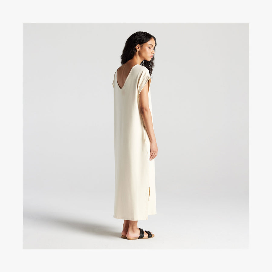 Cream | Full body back view of woman in Sevilla Dress Cream