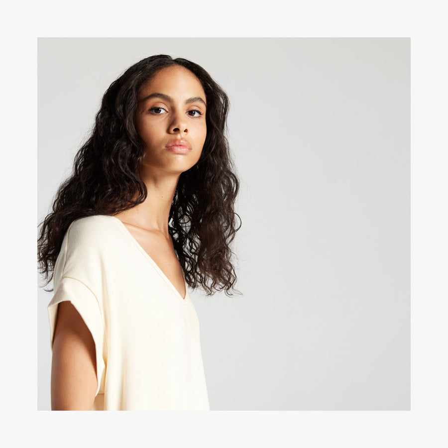 Cream | Shoulder view of woman in Sevilla Dress Cream