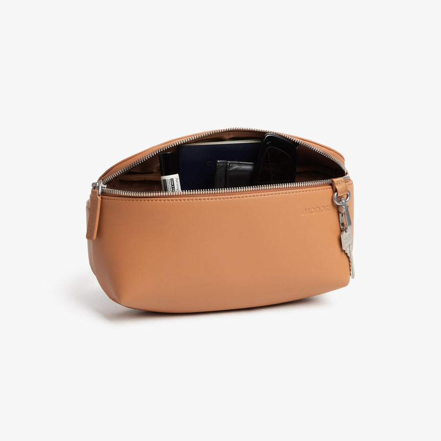 Saddle Tan (Vegan Leather) | Open view of Metro Sling in Saddle Tan