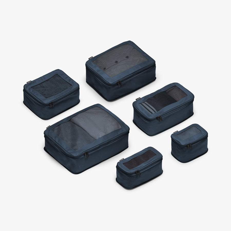 Set of Six / Arles Blue | This is a photo of a set of six compressible packing cubes in Arles Blue